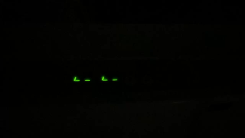 A green lights on a black background

AI-generated content may be incorrect.