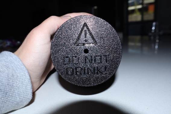 A hand holding a round object

AI-generated content may be incorrect.