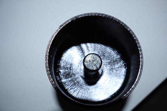 A close-up of a black object

AI-generated content may be incorrect.