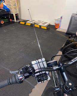 A bicycle with a cable attached to it

AI-generated content may be incorrect.