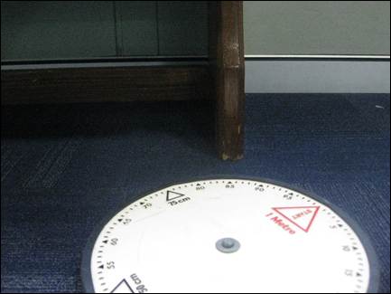 A circular object on the floor

AI-generated content may be incorrect.