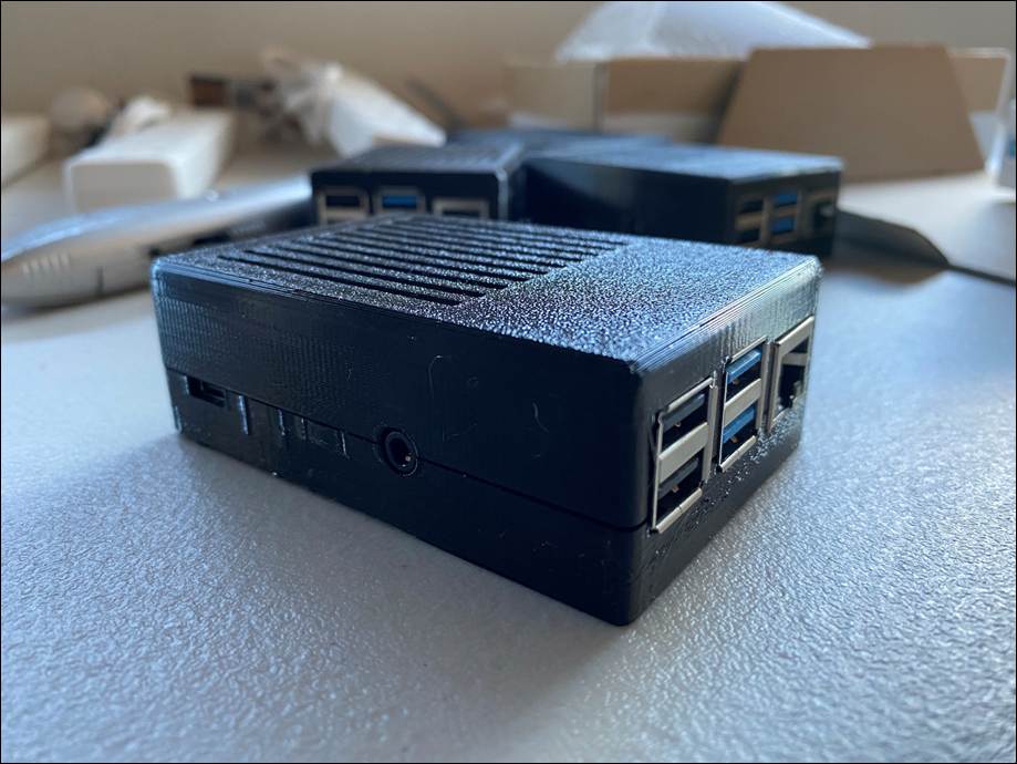 A black rectangular object with many ports

AI-generated content may be incorrect.